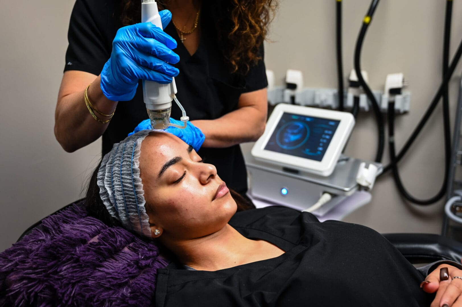 A woman getting her hair and face waxed